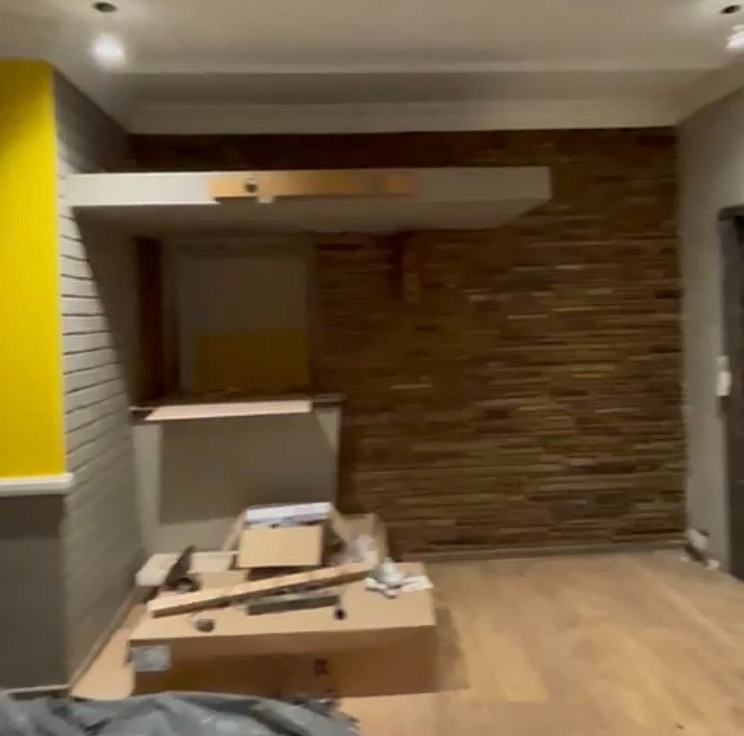 Centurion mismatched feature wall before - Fay Furnishings